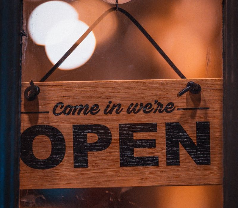 A welcoming, open door with a soft golden light emanating from within.
